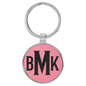 Pink Lasered Leatherette/Metal Round Keychain